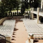 A high up view of Memorial Terrace set up with rows of chairs for a wedding ceremomy